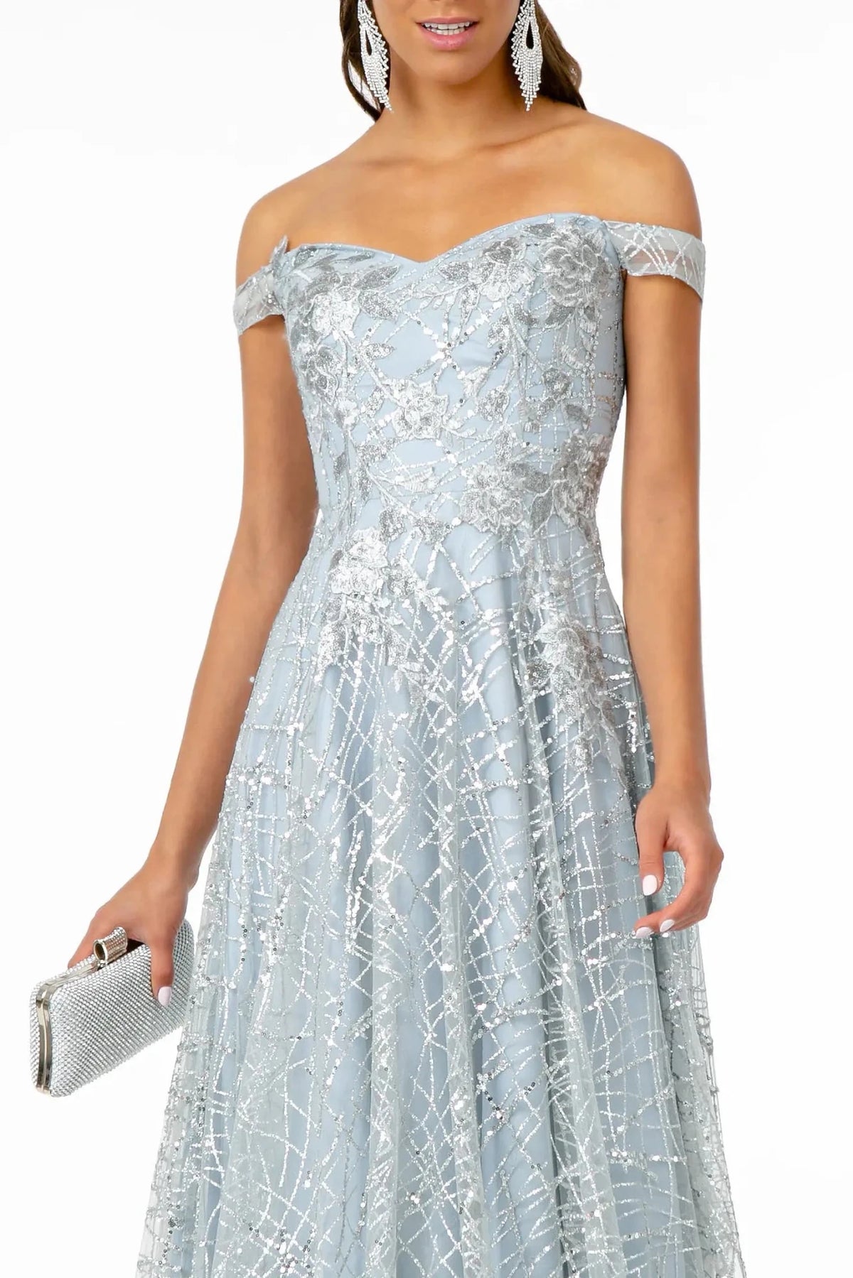 Bodice close-up reveals embroidery, glitter, and sequins across the sweetheart upper bodice of the Silver prom evening dress.