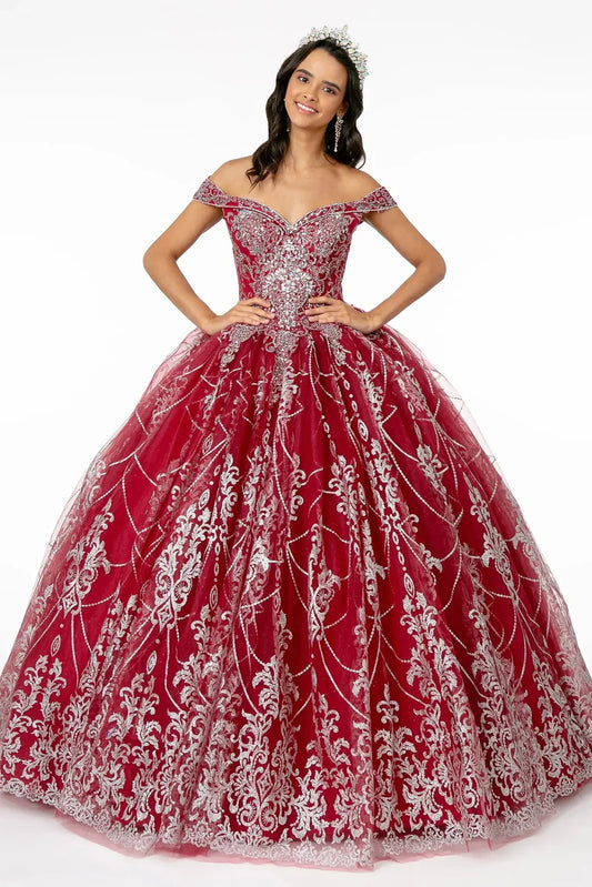 Full-length Burgundy quinceañera ball gown showcases silver floral scrollwork over a burgundy off-shoulder ball skirt.