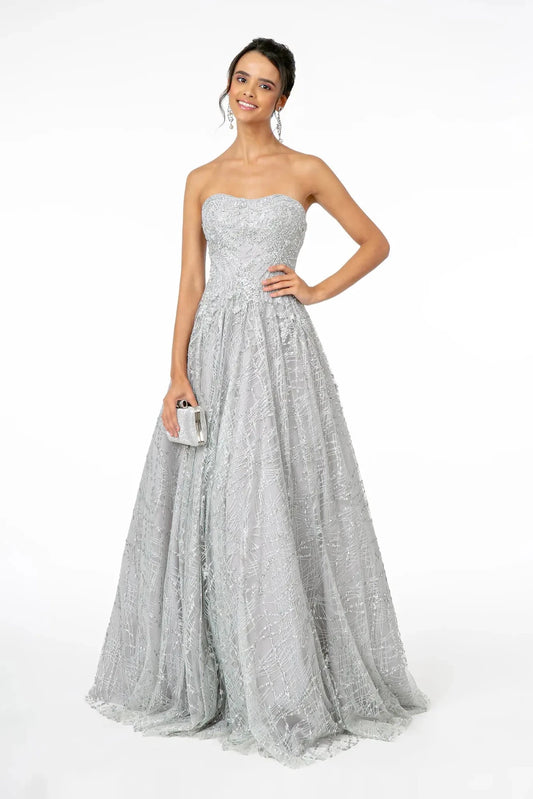 Full-length front view shows glitter styling on the Silver prom evening dress.