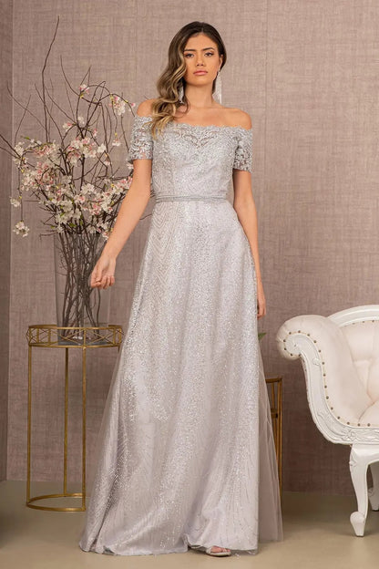 Intricate features stand out across silver beading embellished embroidery formal dress detail.