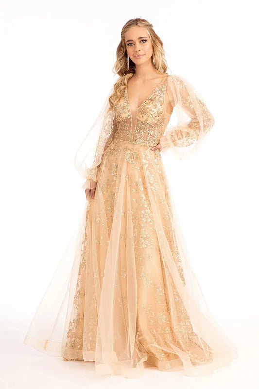 Full-length view highlights champagne glitter sequin long sleeve mother of the bride dress.