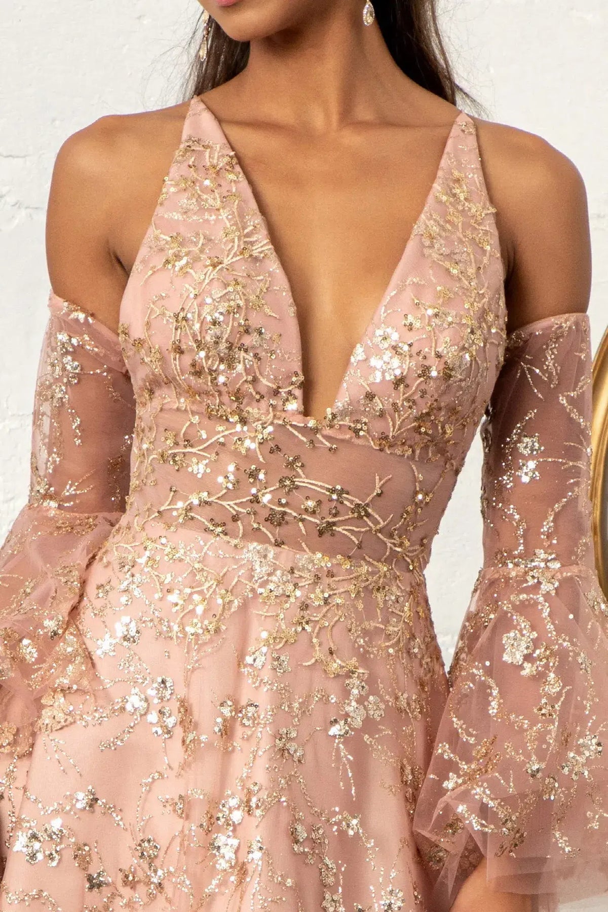 Rose Gold mother of the bride dress with a sheer inset plunging neckline