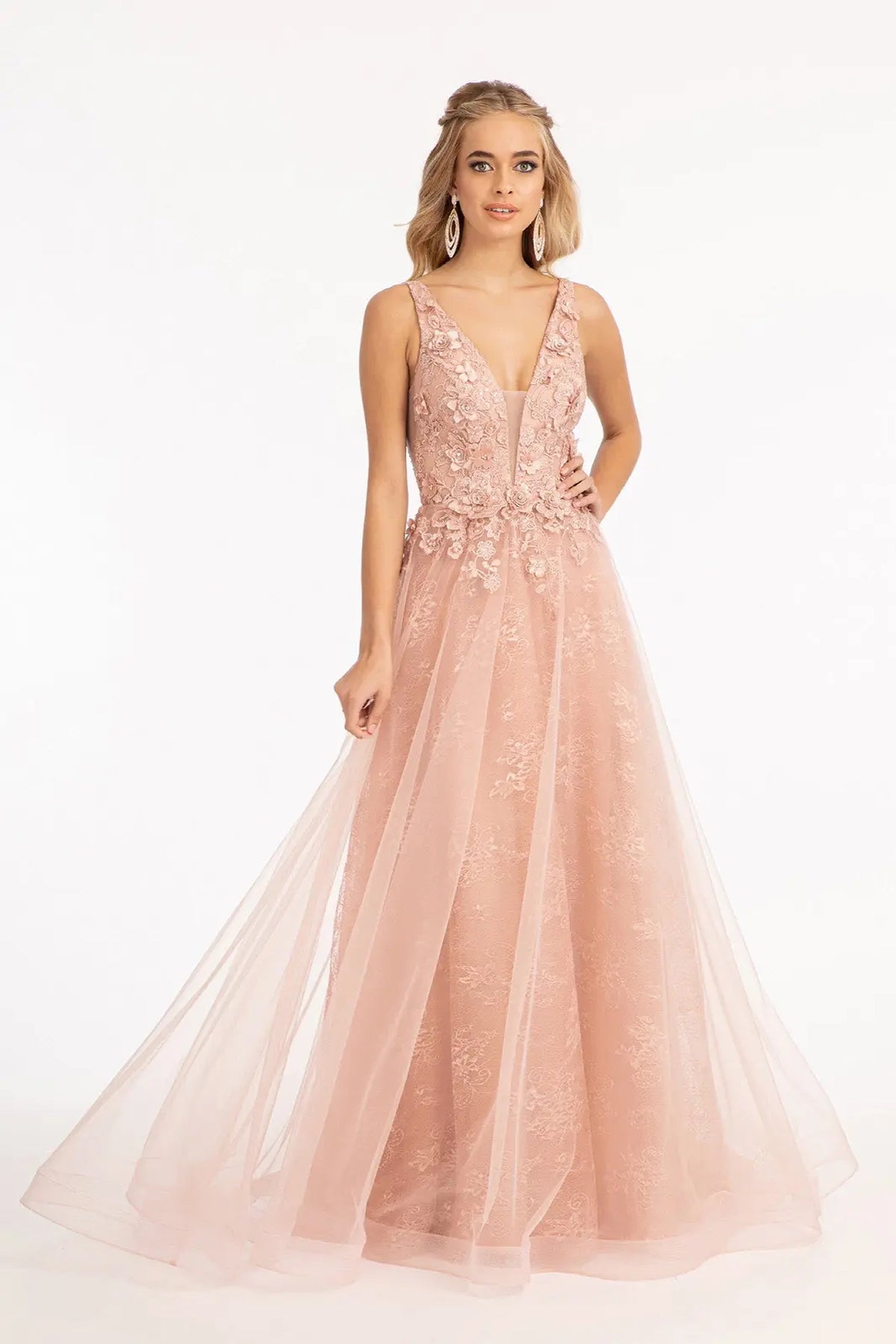 Soft mesh spreads from the floral bodice into the A-line skirt of this Rose Gold wedding gown.
