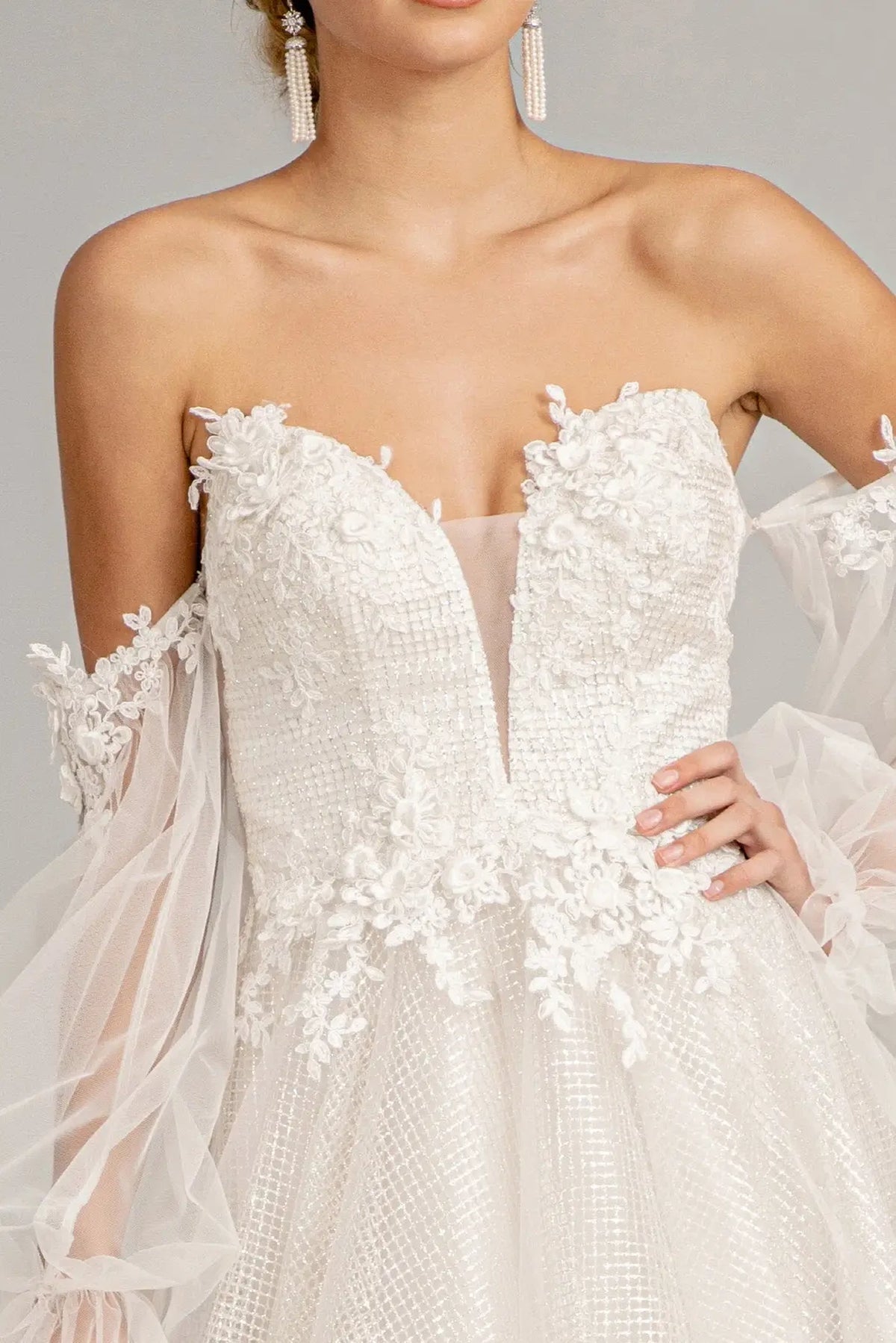 Off White mother of the bride dress with a plunging sweetheart neckline
