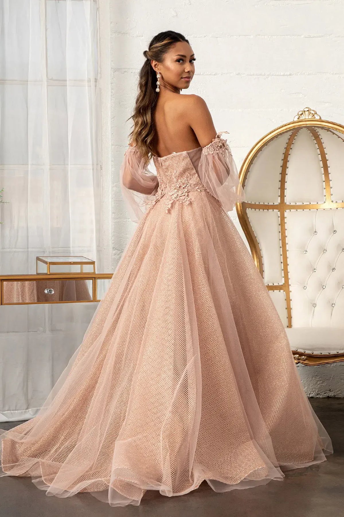 Rose Gold mother of the bride dress with a low open back and chapel train