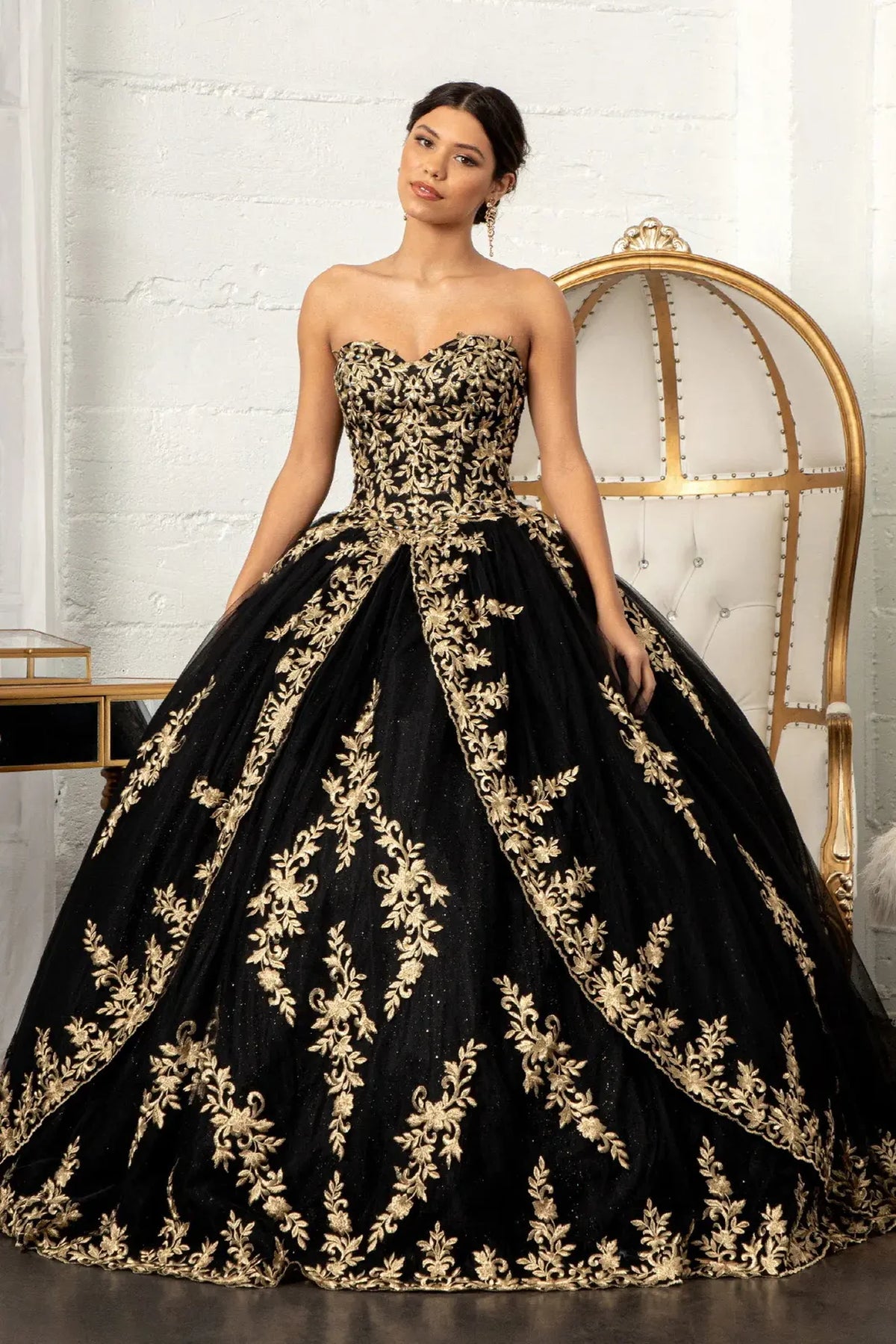 Lace-up back reveals the Black quinceañera ball gown with lace-up back and metallic embroidery.