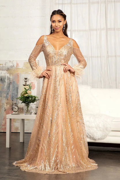 Rear view reveals rose Gold sequin feather sleeve mother of the bride dress.