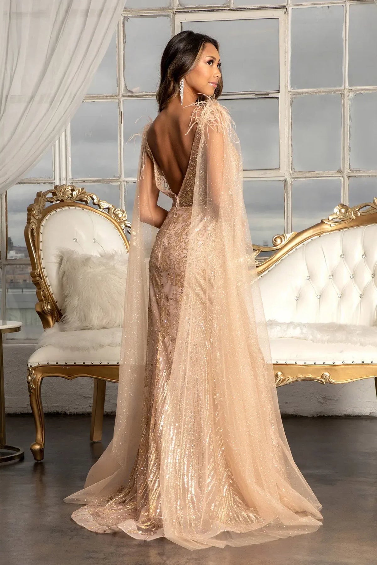 Rose Gold mother of the bride dress with a plunging V-back