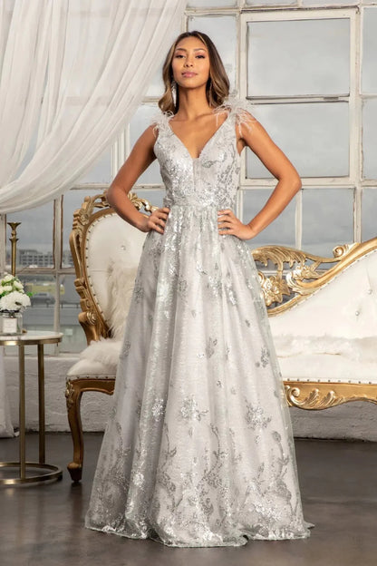 Full-length view highlights silver mesh sequin feather shoulder mother of the bride dress.