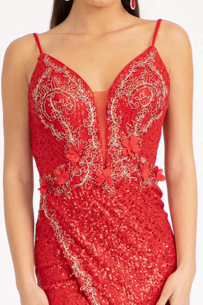 Bodice close-up highlights red mother of the bride dress featuring illusion v-neck bodice with spaghetti strap and applique, beads.