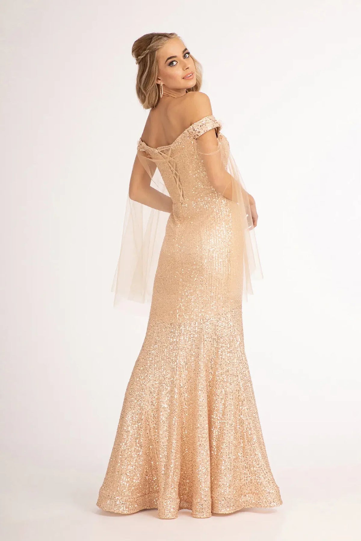 Rose Gold mother of the bride dress with a lace-up back and soft cape drapes
