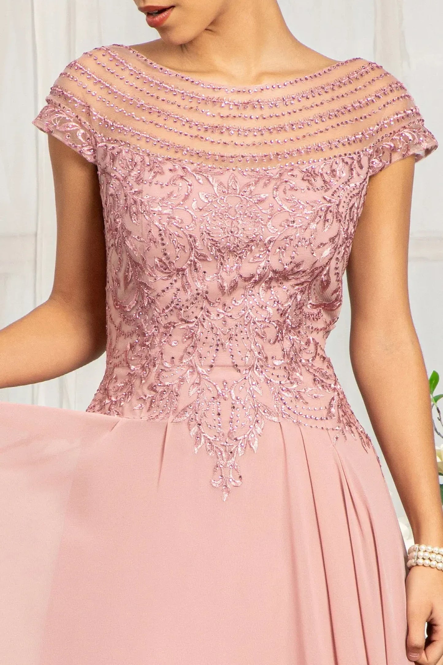 Dusty Rose mother of the bride dress featuring boat-neck bodice with cap sleeve and beads, embroidery