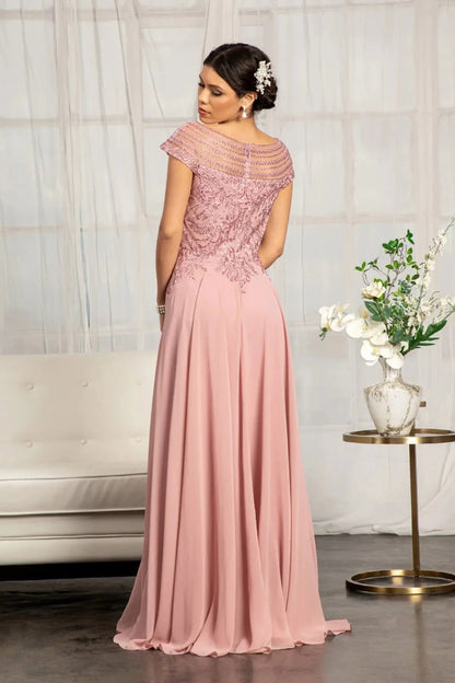 Rear view reveals dusty Rose a-line mother of the bride dress with concealed zipper back and cap sleeve.