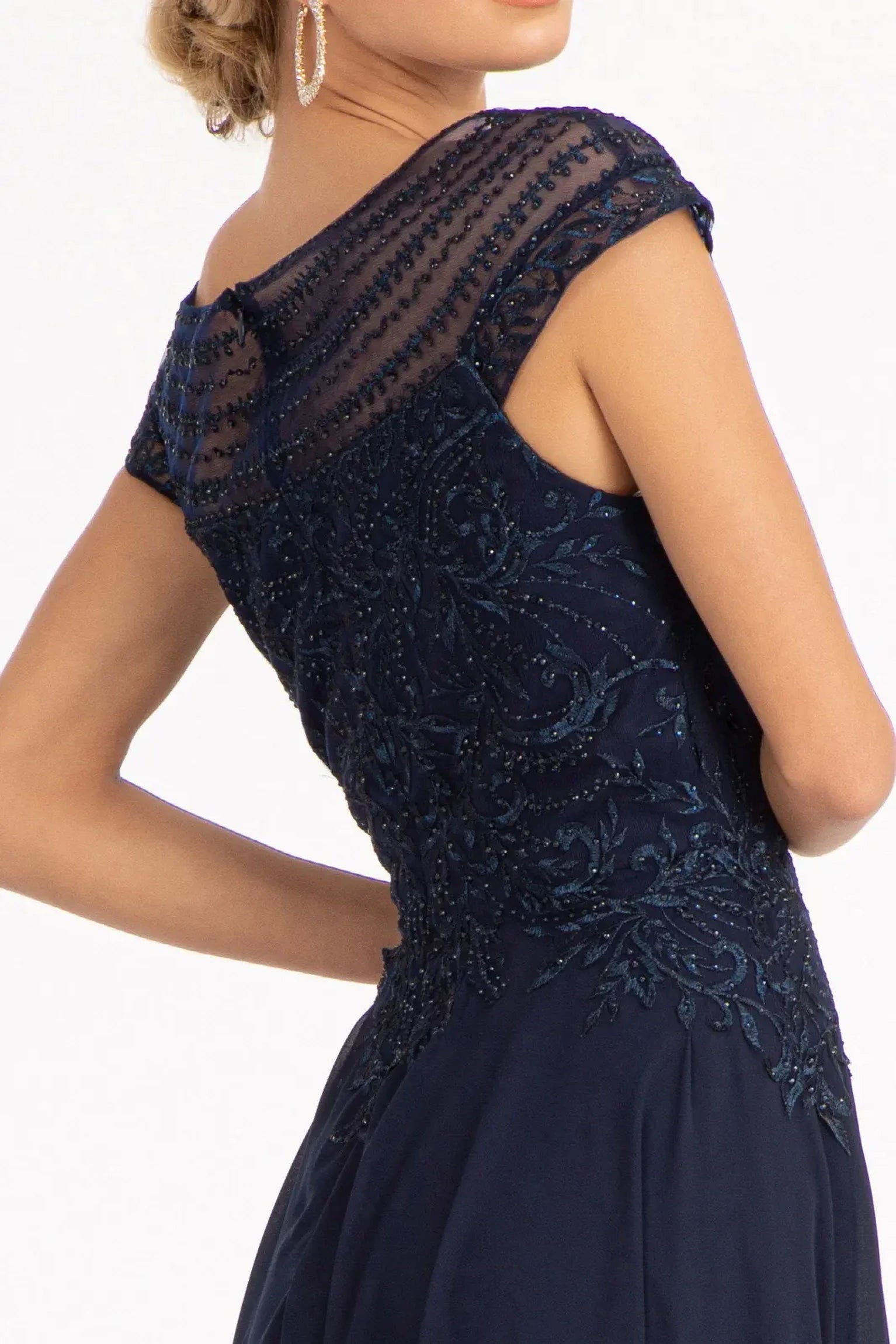 Navy mother of the bride dress featuring concealed zipper back bodice finished with beads, embroidery