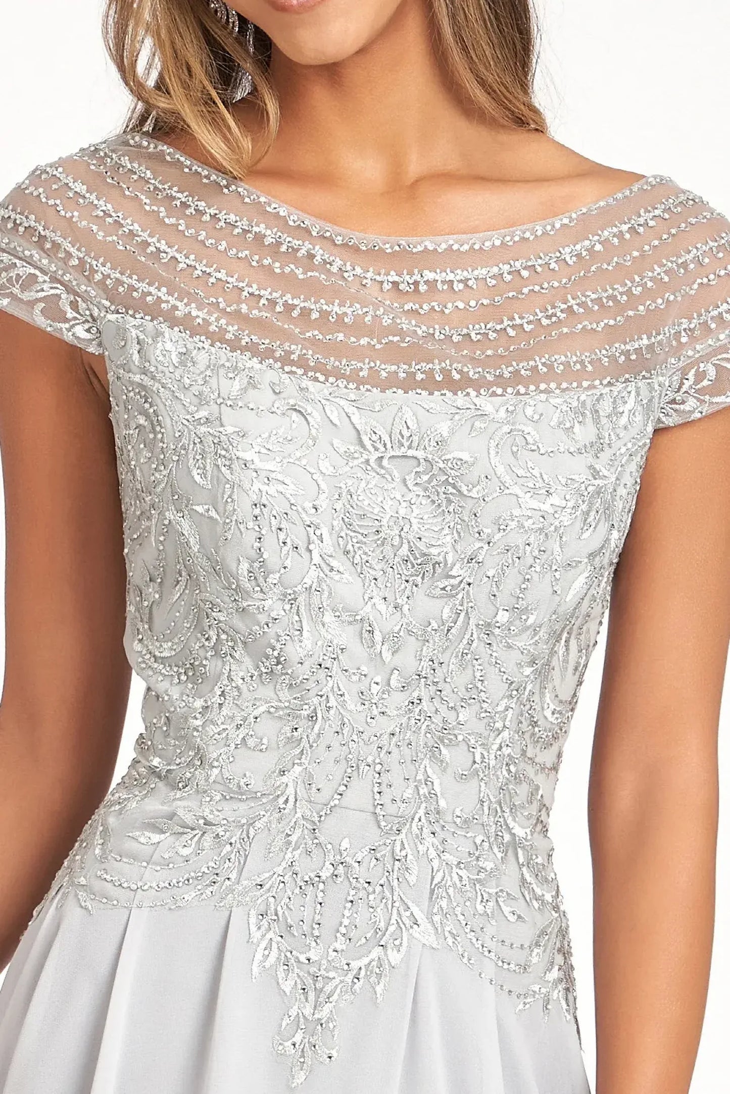 Silver mother of the bride dress featuring boat-neck bodice with cap sleeve and beads, embroidery