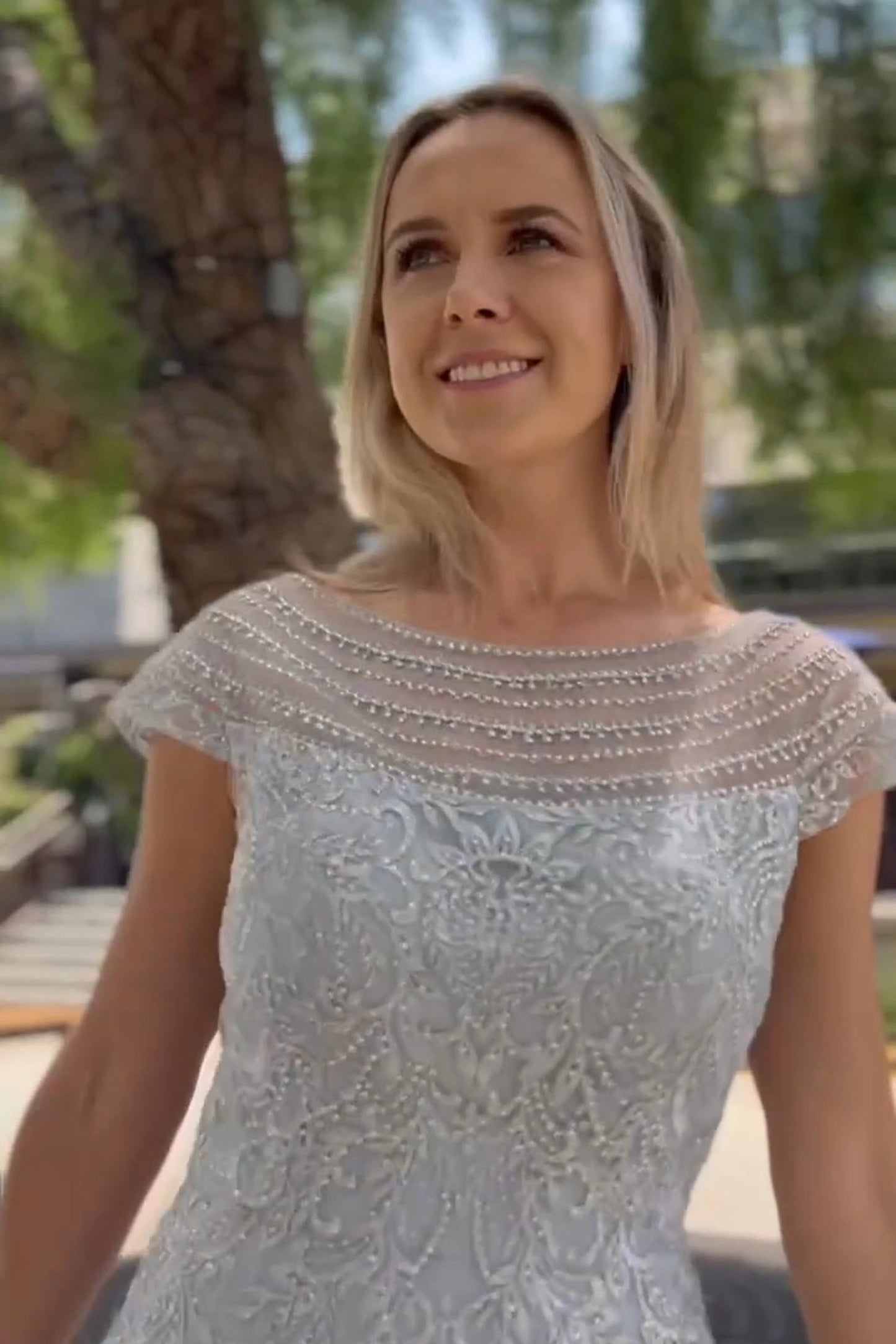 Silver cap sleeve mother of the bride dress with beads, embroidery