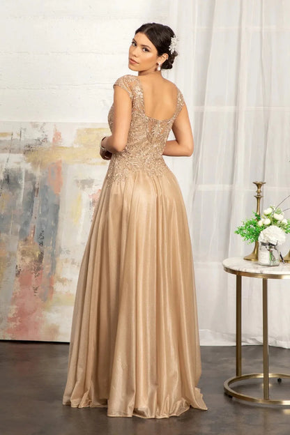 Rear view reveals gold a-line mother of the bride dress with concealed zipper back and cap sleeve.