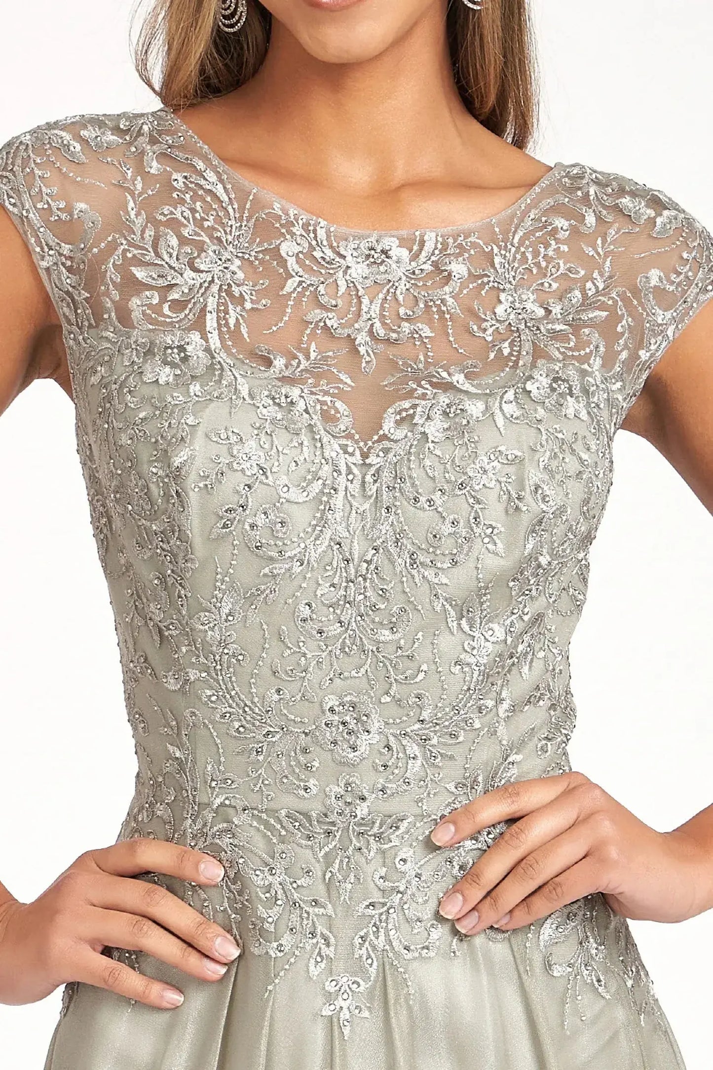 Silver mother of the bride dress featuring boat-neck bodice with cap sleeve and beads, embroidery