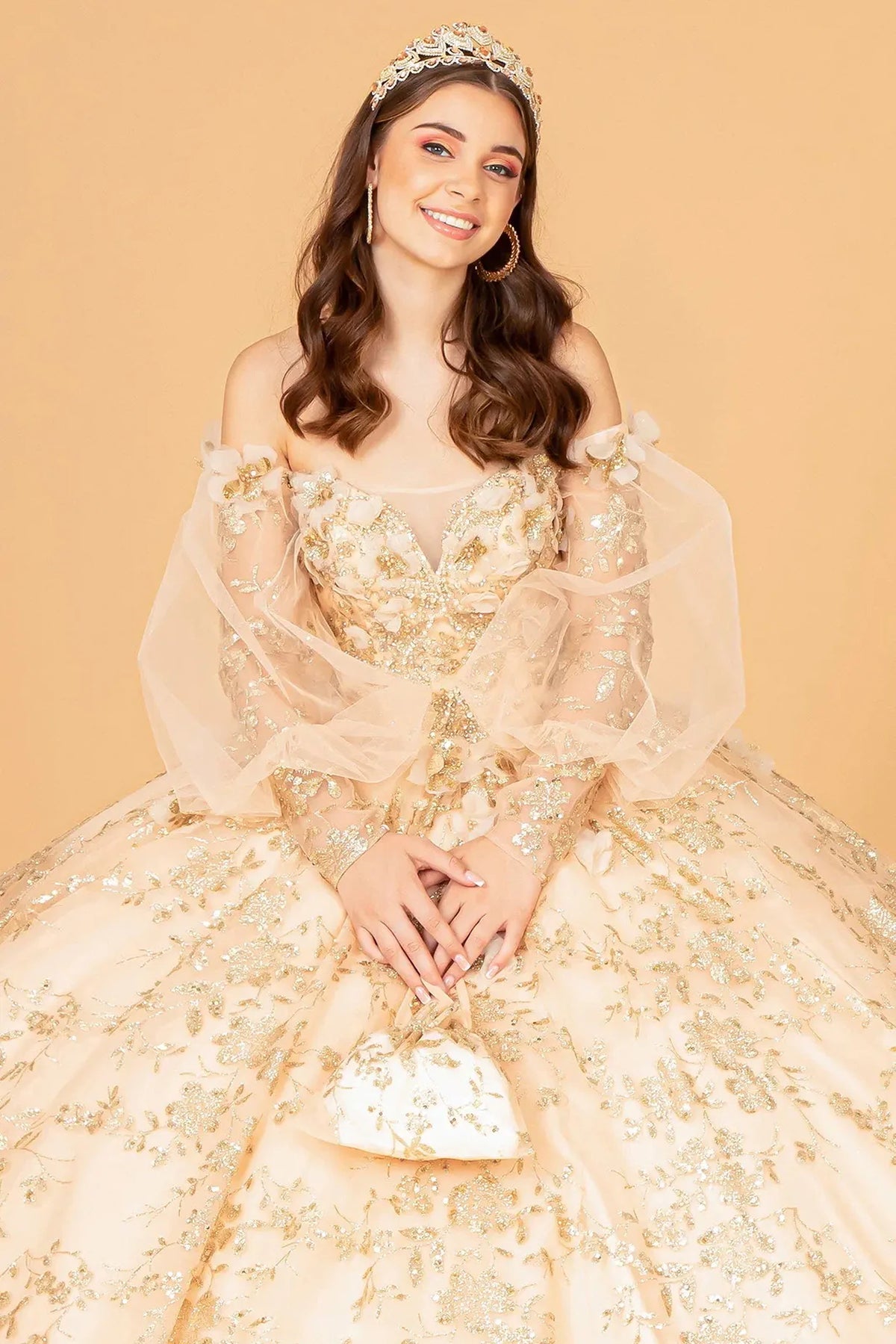 Full-length view presents the Gold quinceañera ball gown with detachable back bow.