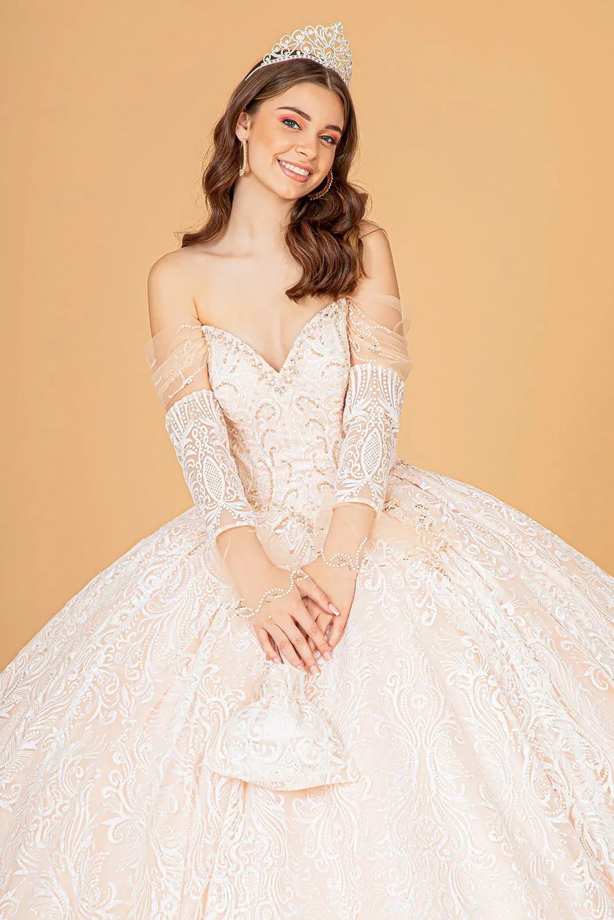 Full-length view presents the Champagne quinceañera ball gown with detachable trumpet sleeves.