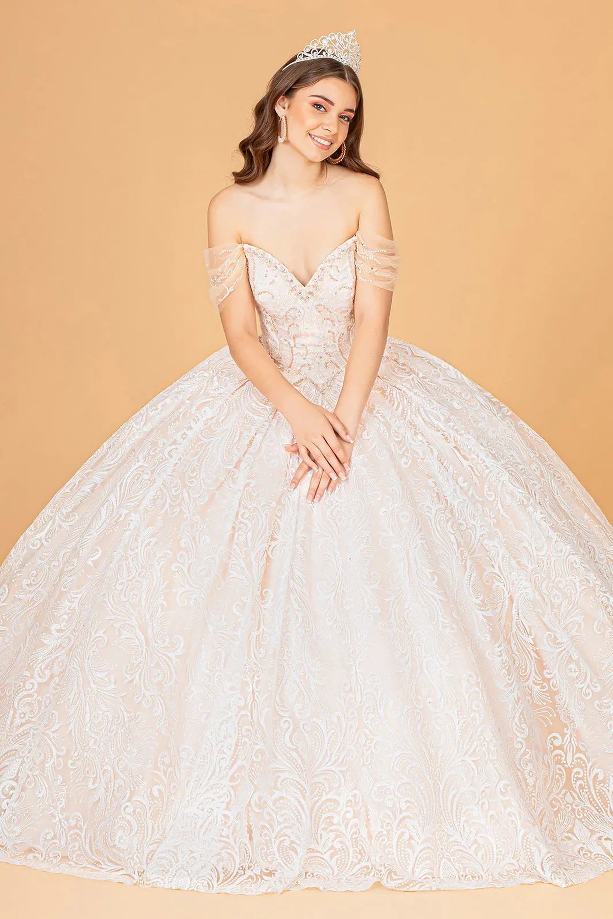 Lace-up back reveals the Champagne quinceañera ball gown with lace-up back and matching mini bag.