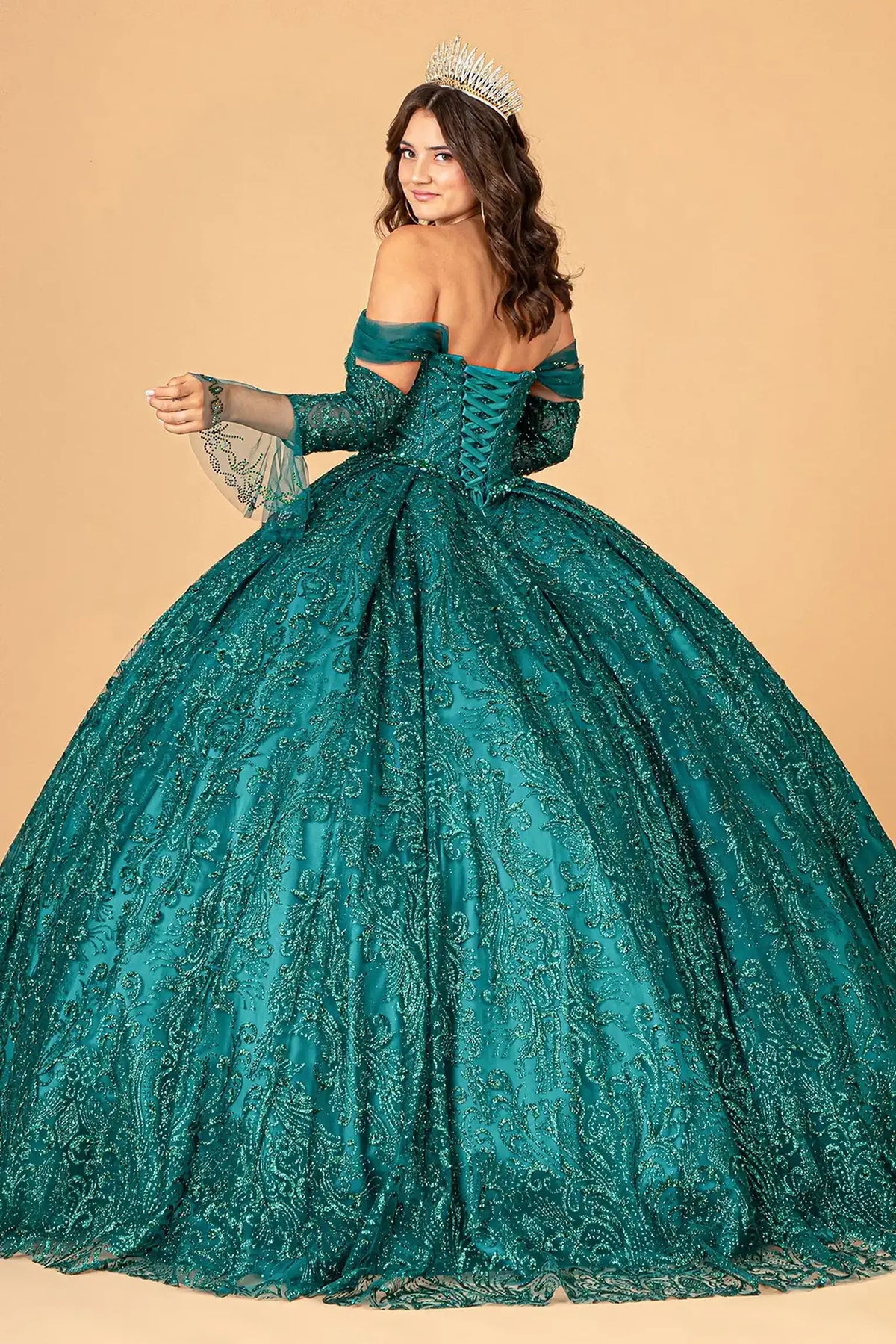 Bodice close-up highlights the Green quinceañera ball gown with matching mini bag.
