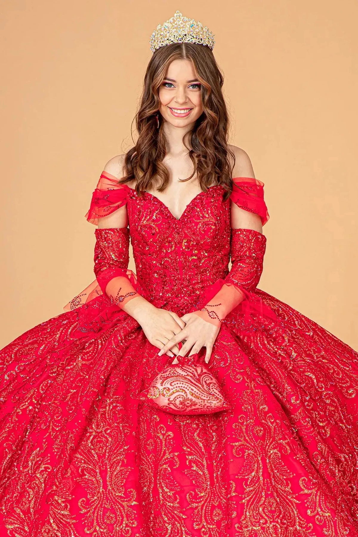 Full-length view presents the Red quinceañera ball gown with detachable trumpet sleeves.