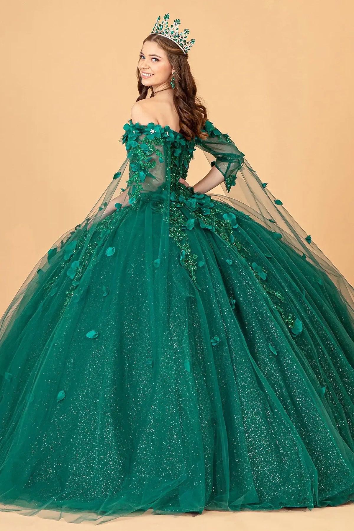 Bodice close-up highlights the Green quinceañera ball gown with 3d floral appliqués.