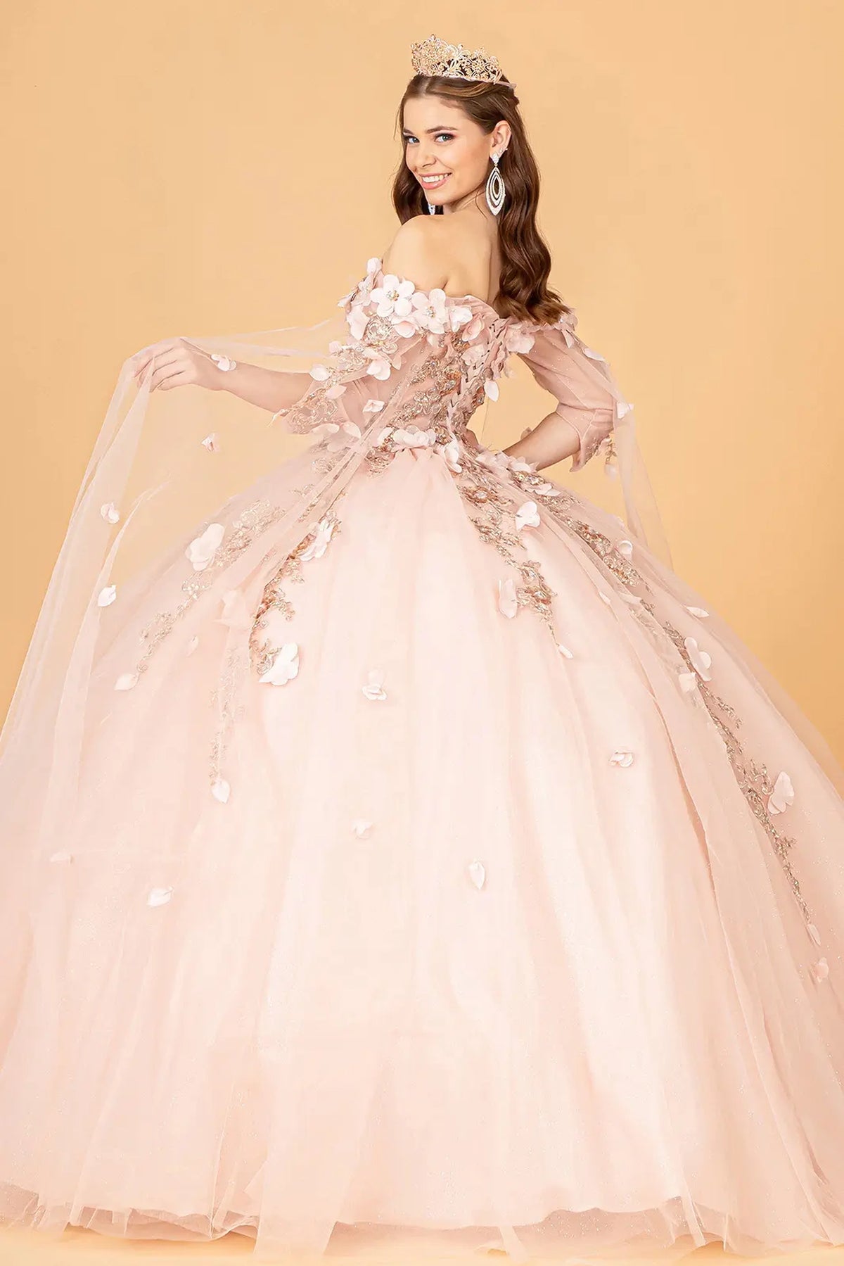 Bodice close-up highlights the Rose Gold quinceañera ball gown with 3d floral appliqués.