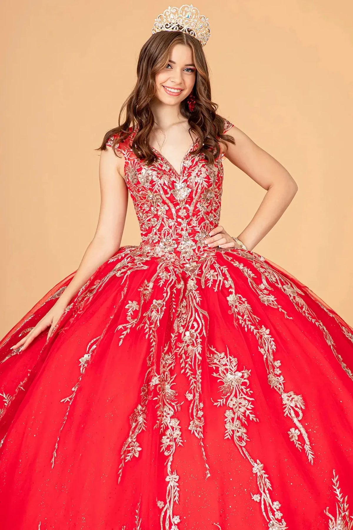 Full-length view presents the Red quinceañera ball gown with gold metallic embroidery.