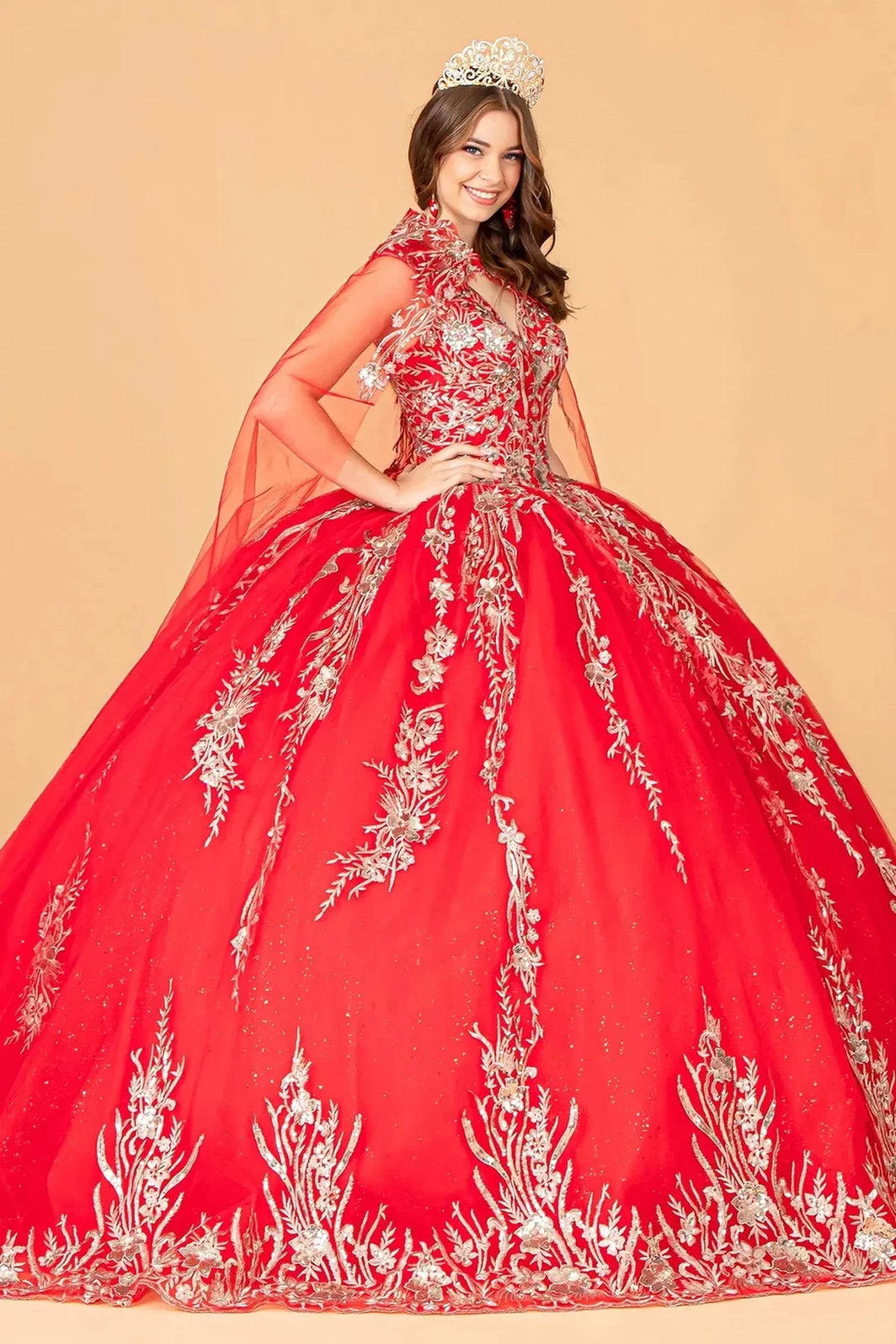 Embroidered details frame the Red quinceañera ball gown with gold metallic embroidery.