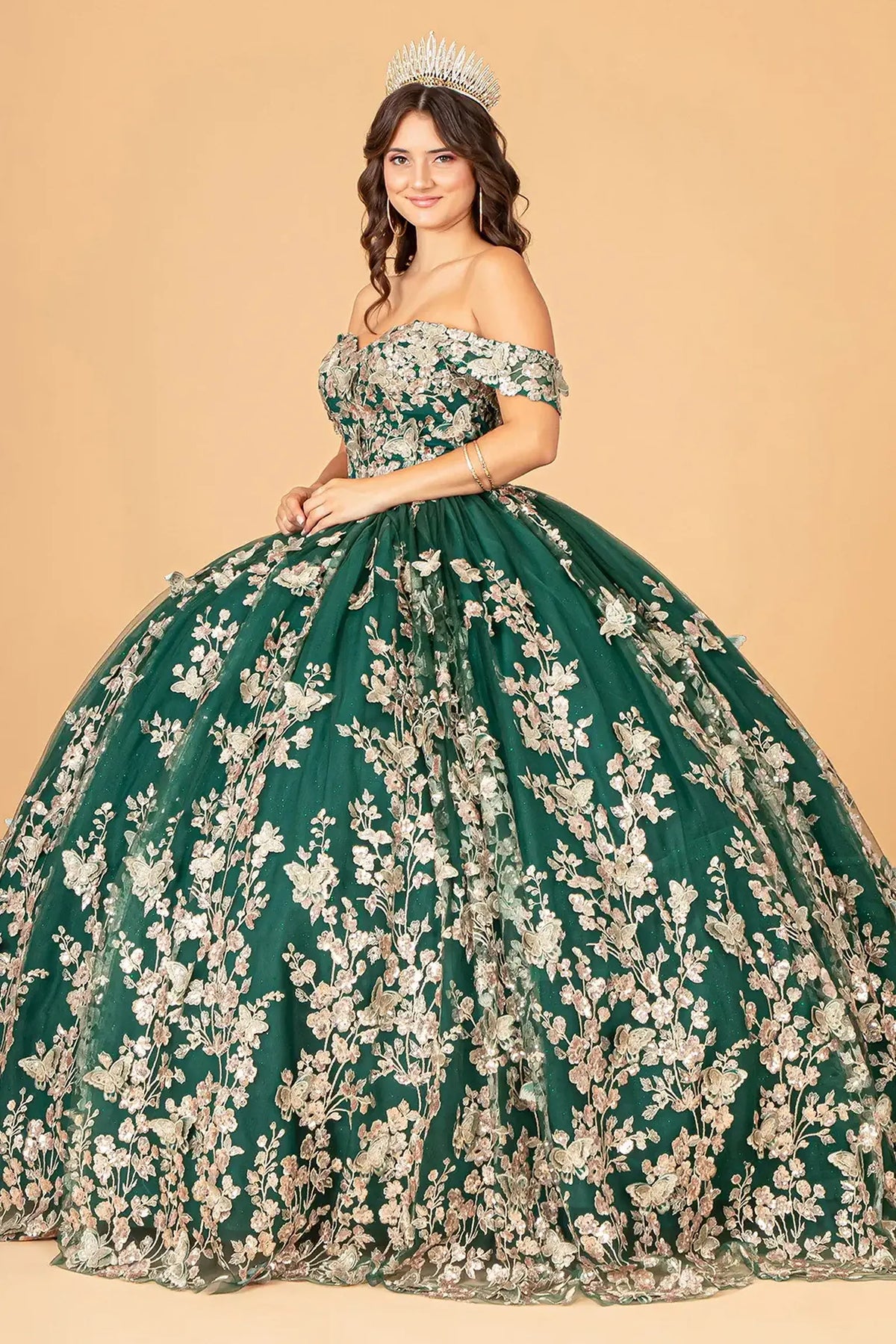 Embroidered details frame the Green quinceañera ball gown with 3d butterfly appliqués.