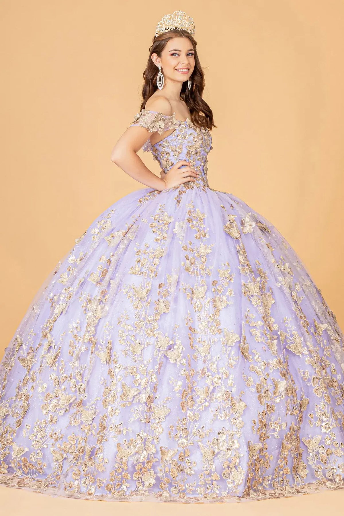 Embroidered details frame the Lilac quinceañera ball gown with 3d butterfly appliqués.