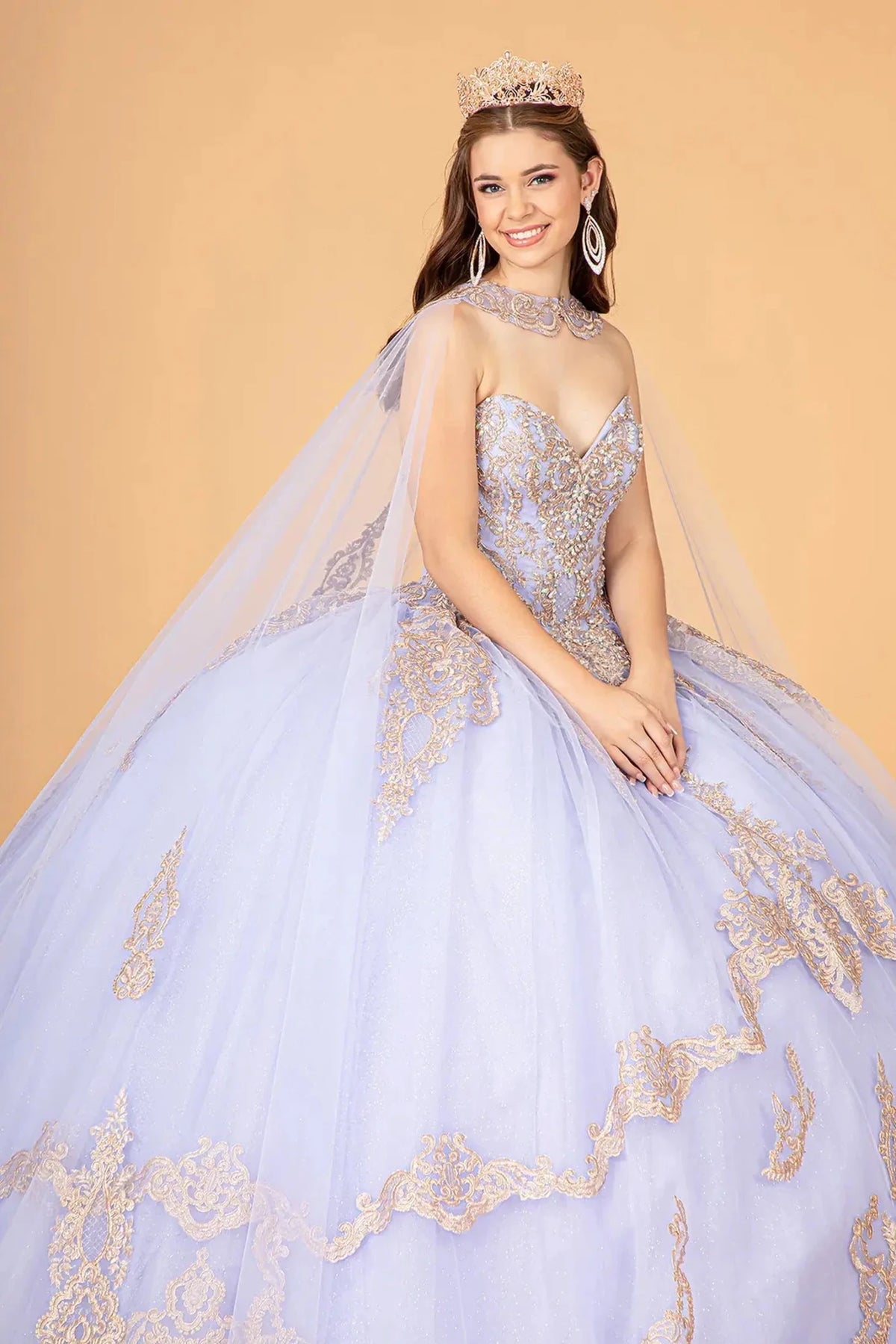 Lace-up back reveals the Lilac quinceañera ball gown with lace-up back and jeweled glitter mesh.