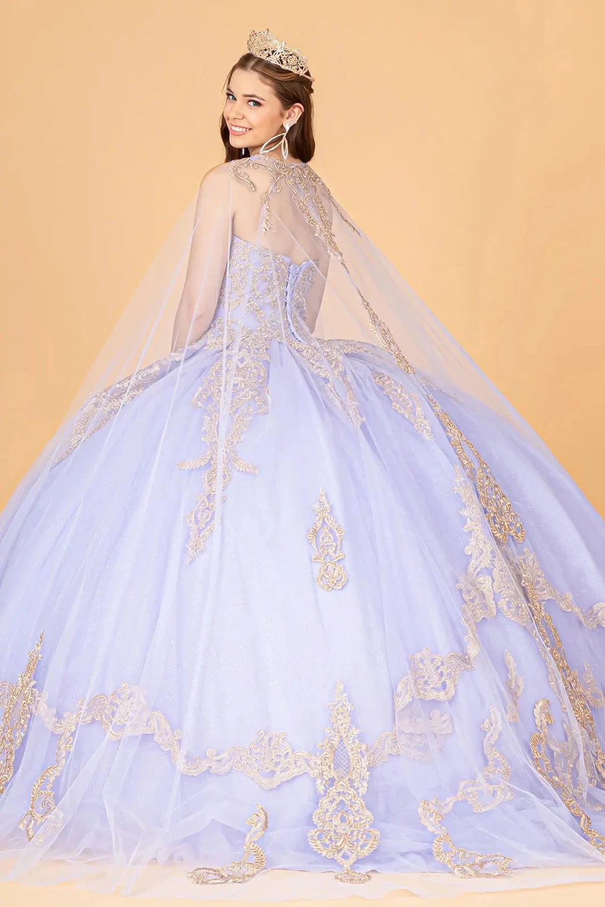 Bodice close-up highlights the Lilac quinceañera ball gown with jeweled glitter mesh.