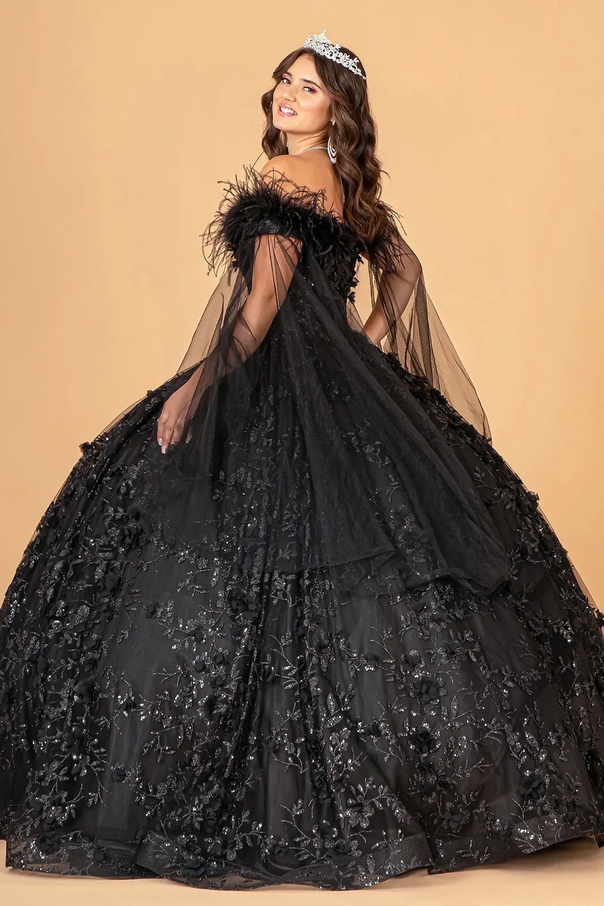 Bodice close-up highlights the Black quinceañera ball gown with shoulder mesh drapes.