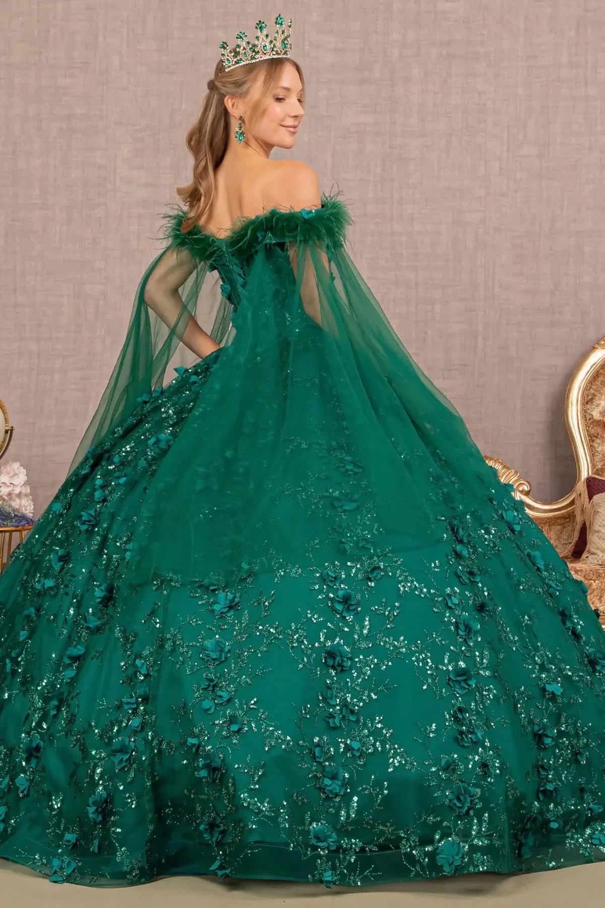 Bodice close-up highlights the Green quinceañera ball gown with shoulder mesh drapes.