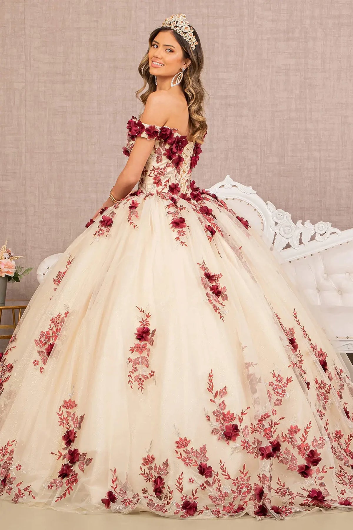 Bodice close-up highlights the Burgundy/Nude quinceañera ball gown with jeweled mesh skirt.