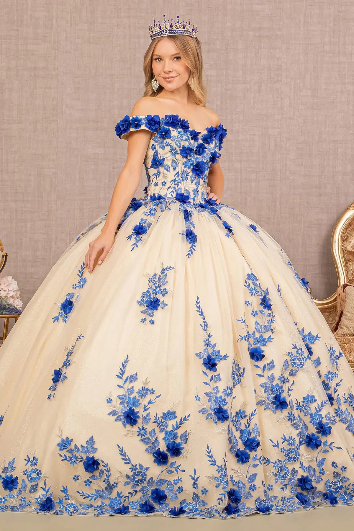 Lace-up back reveals the Royal Blue/Nude quinceañera ball gown with lace-up back and jeweled mesh skirt.