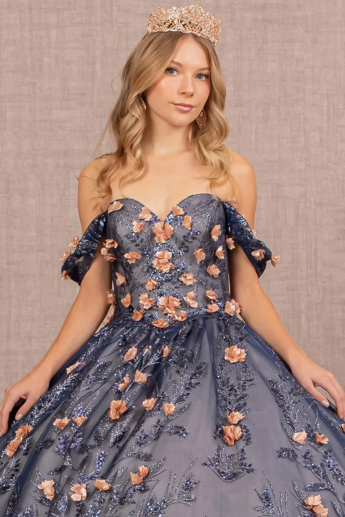 Full-length view presents the Navy quinceañera ball gown with 3d floral appliqués.