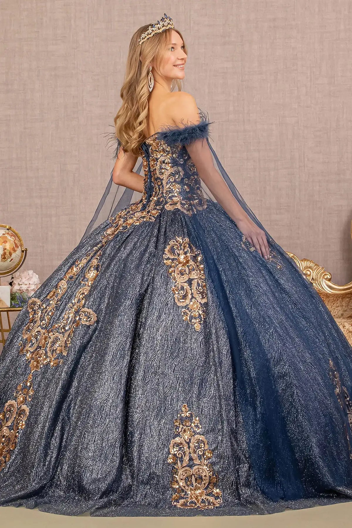 Bodice close-up highlights the Navy quinceañera ball gown with detachable mesh drape.