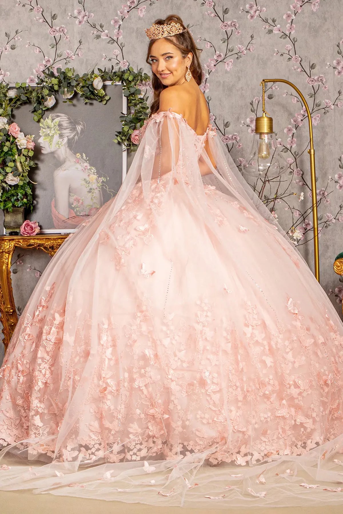 Bodice close-up highlights the Blush quinceañera ball gown with long mesh drape.