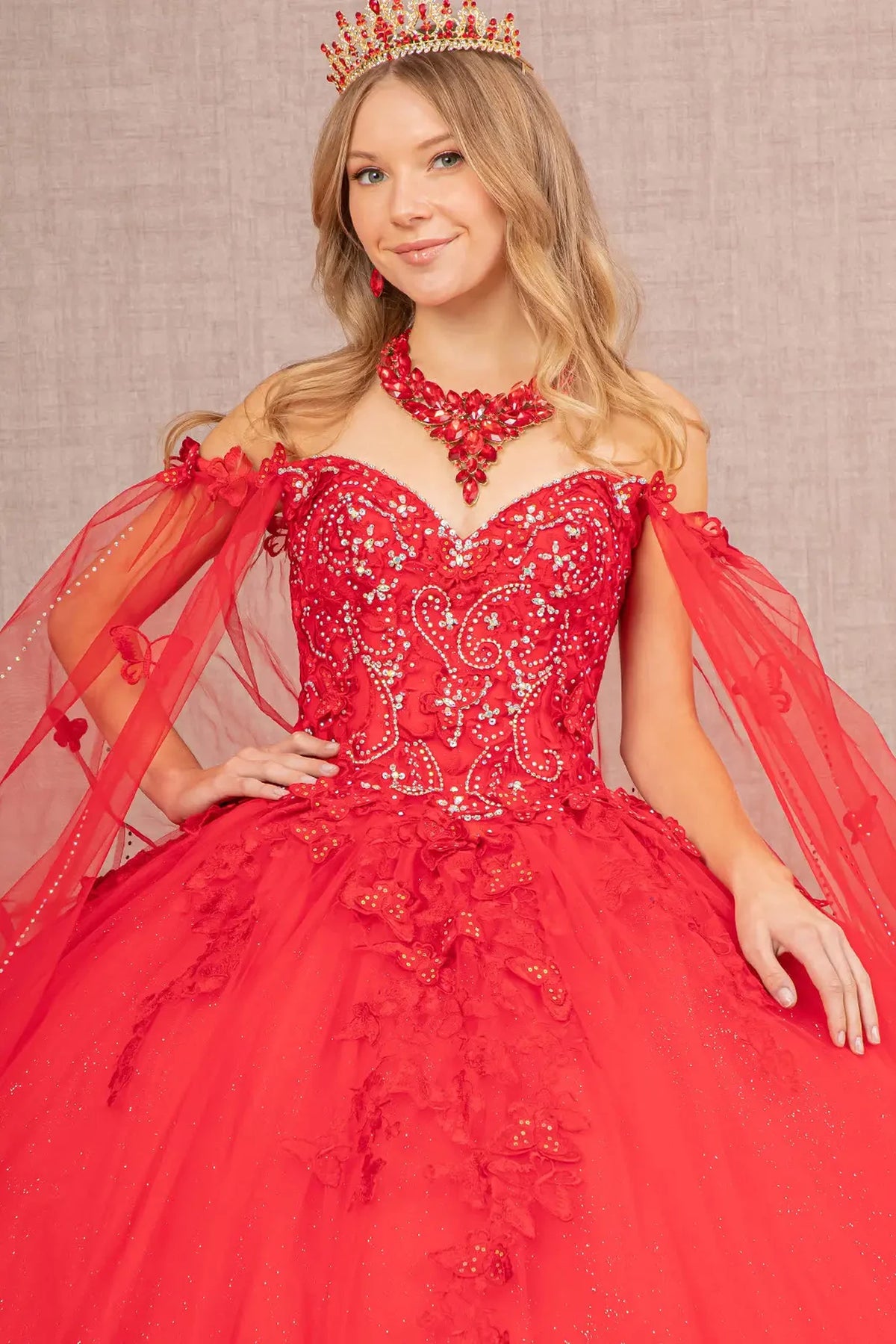 Full-length view presents the Red quinceañera ball gown with 3d butterfly appliqués.