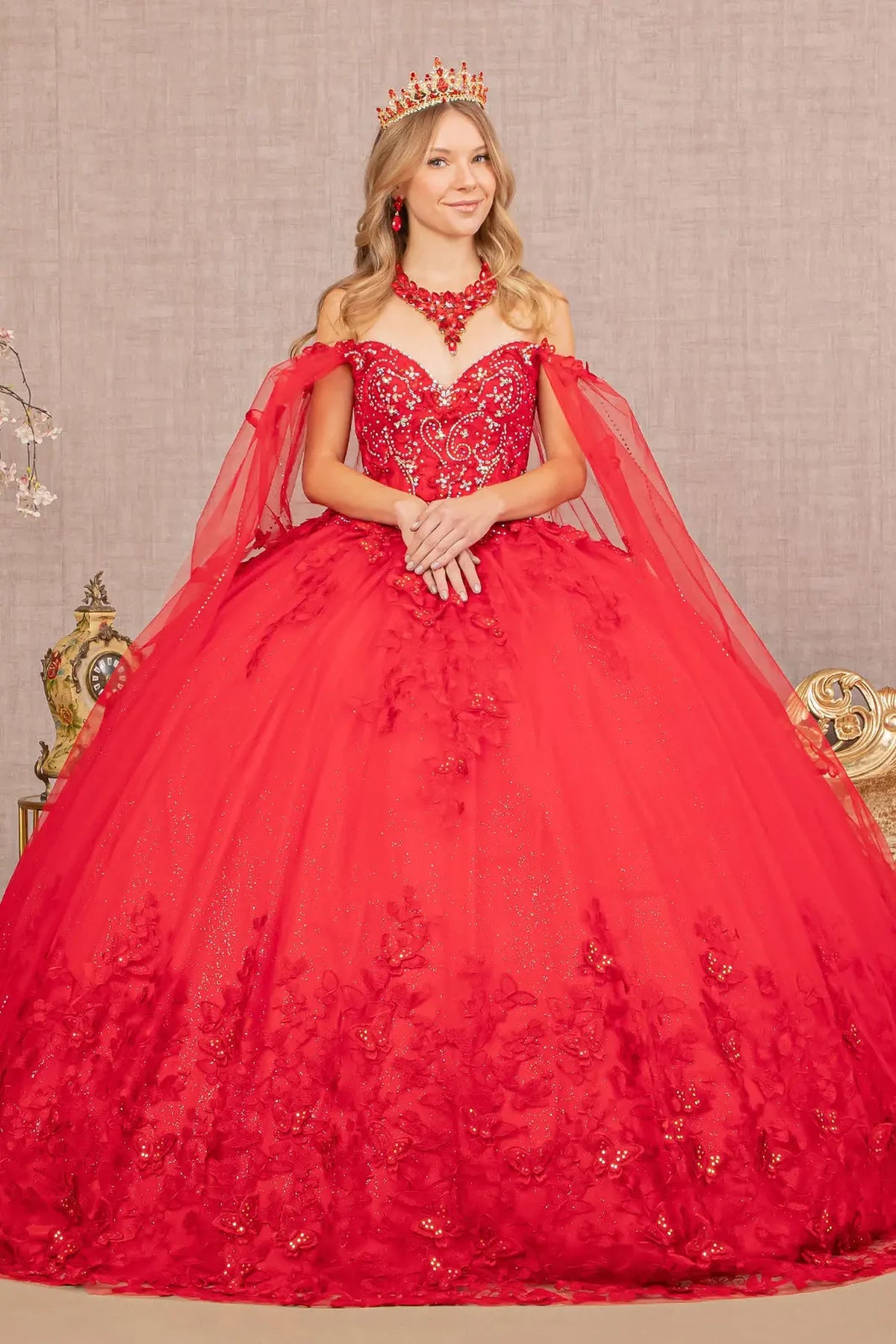 Lace-up back reveals the Red quinceañera ball gown with lace-up back and long mesh drape.