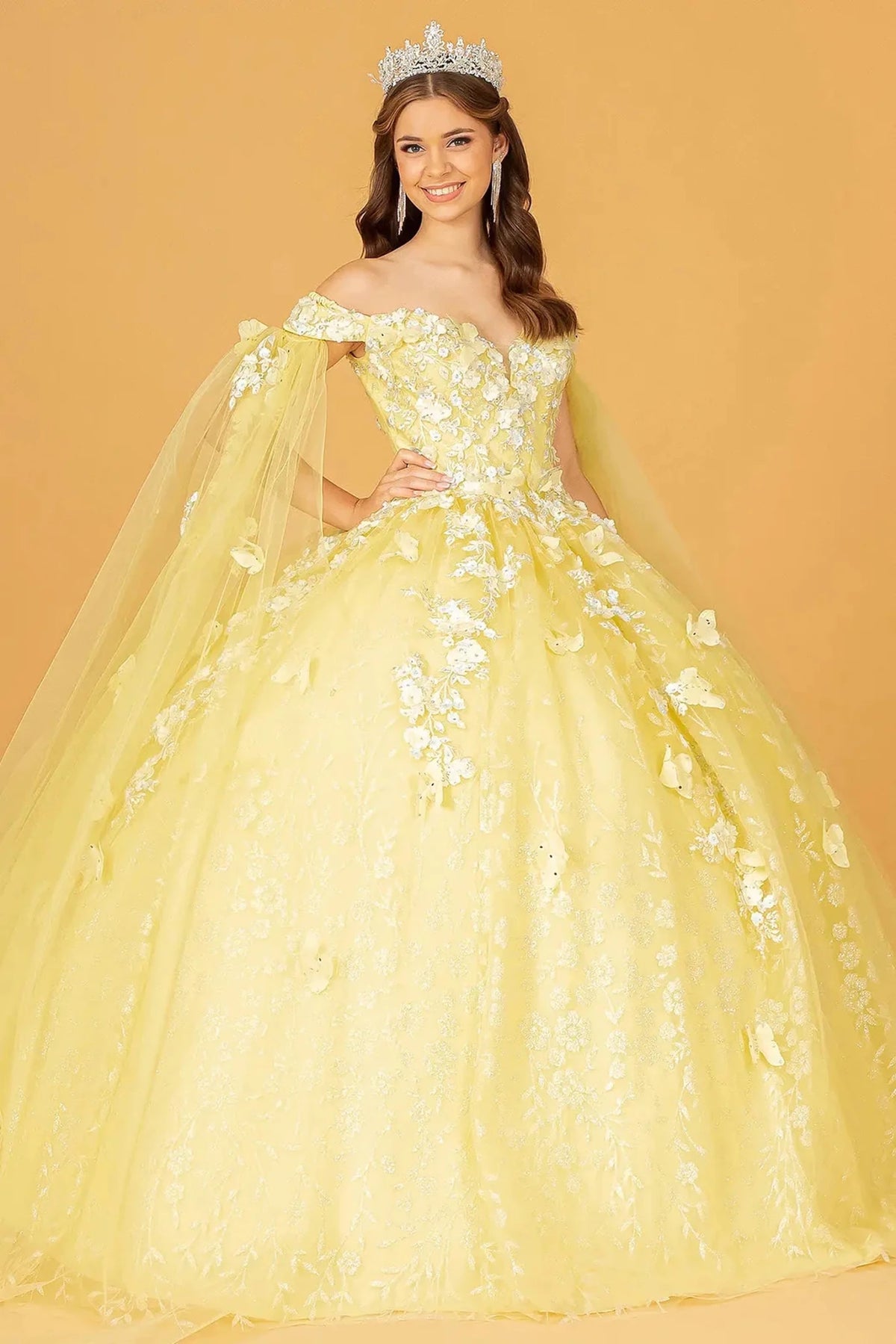 Lace-up back reveals the Yellow quinceañera ball gown with lace-up back and glitter embroidery.