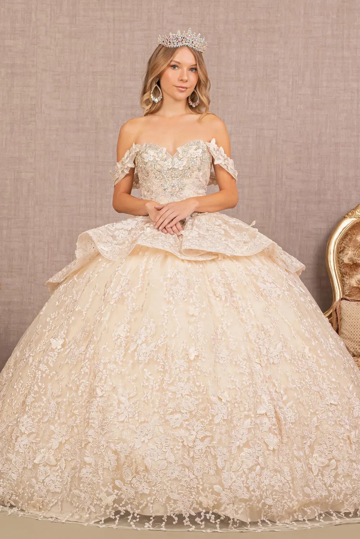 Lace-up back reveals the Champagne quinceañera ball gown with lace-up back and jeweled mesh skirt.