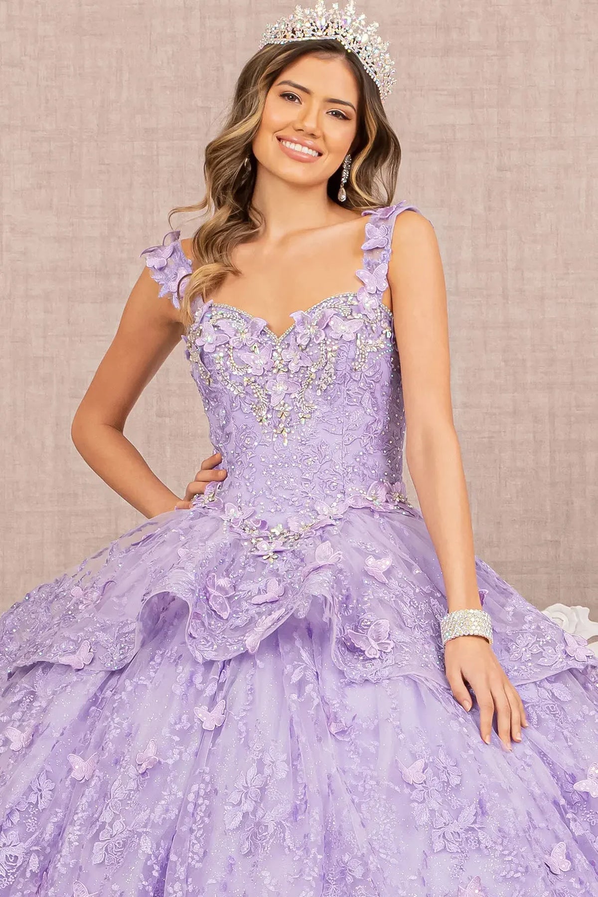 Full-length view presents the Lilac quinceañera ball gown with 3d butterfly appliqués.
