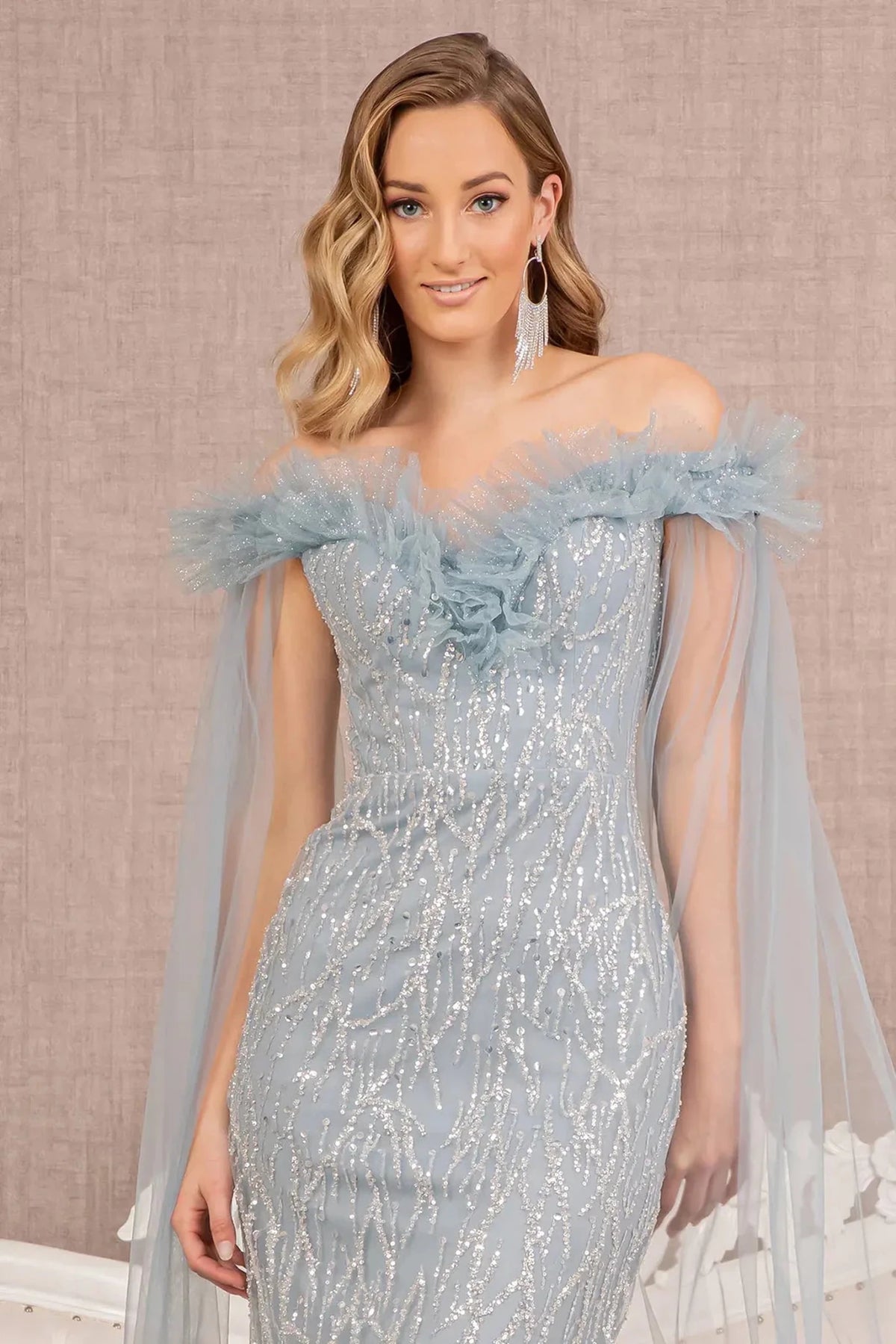 Smoky Blue mother of the bride dress with a feathered off-shoulder bodice