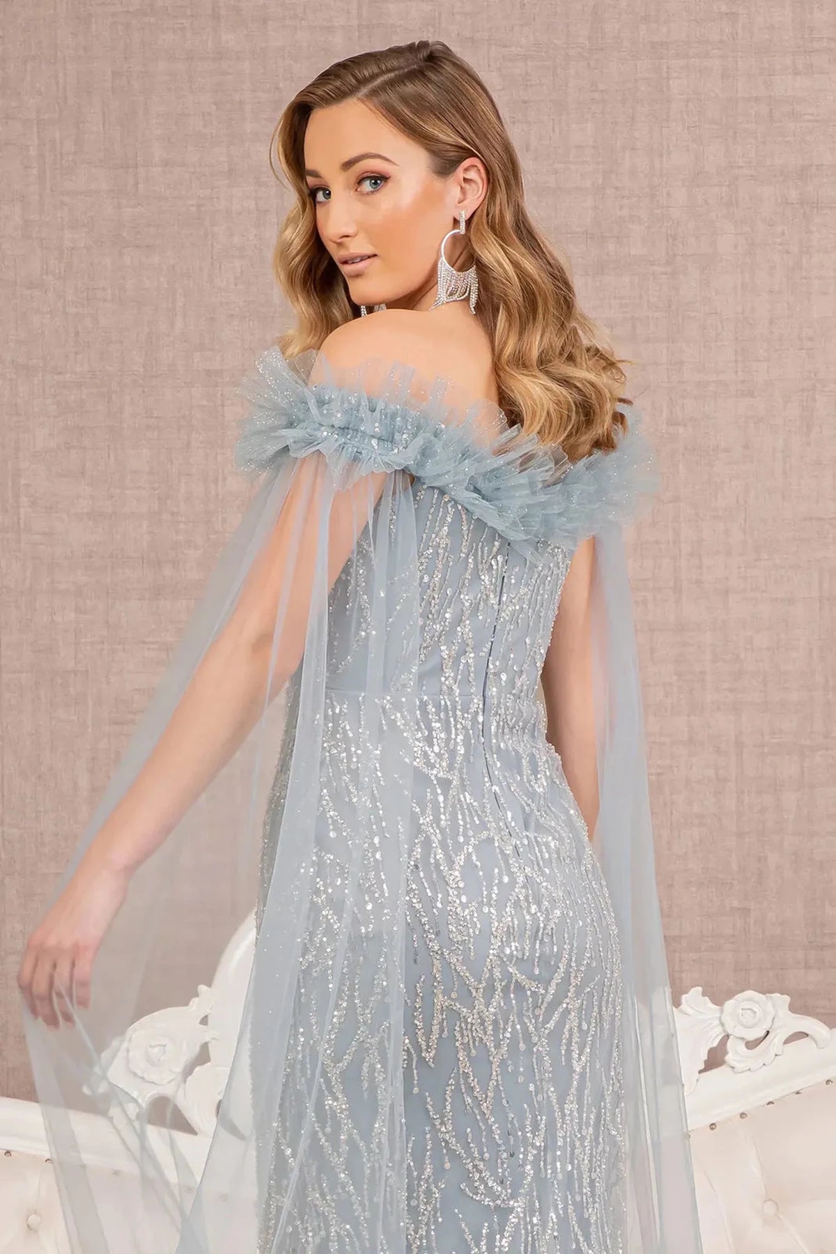 Smoky Blue mother of the bride dress with a long sheer shoulder drape