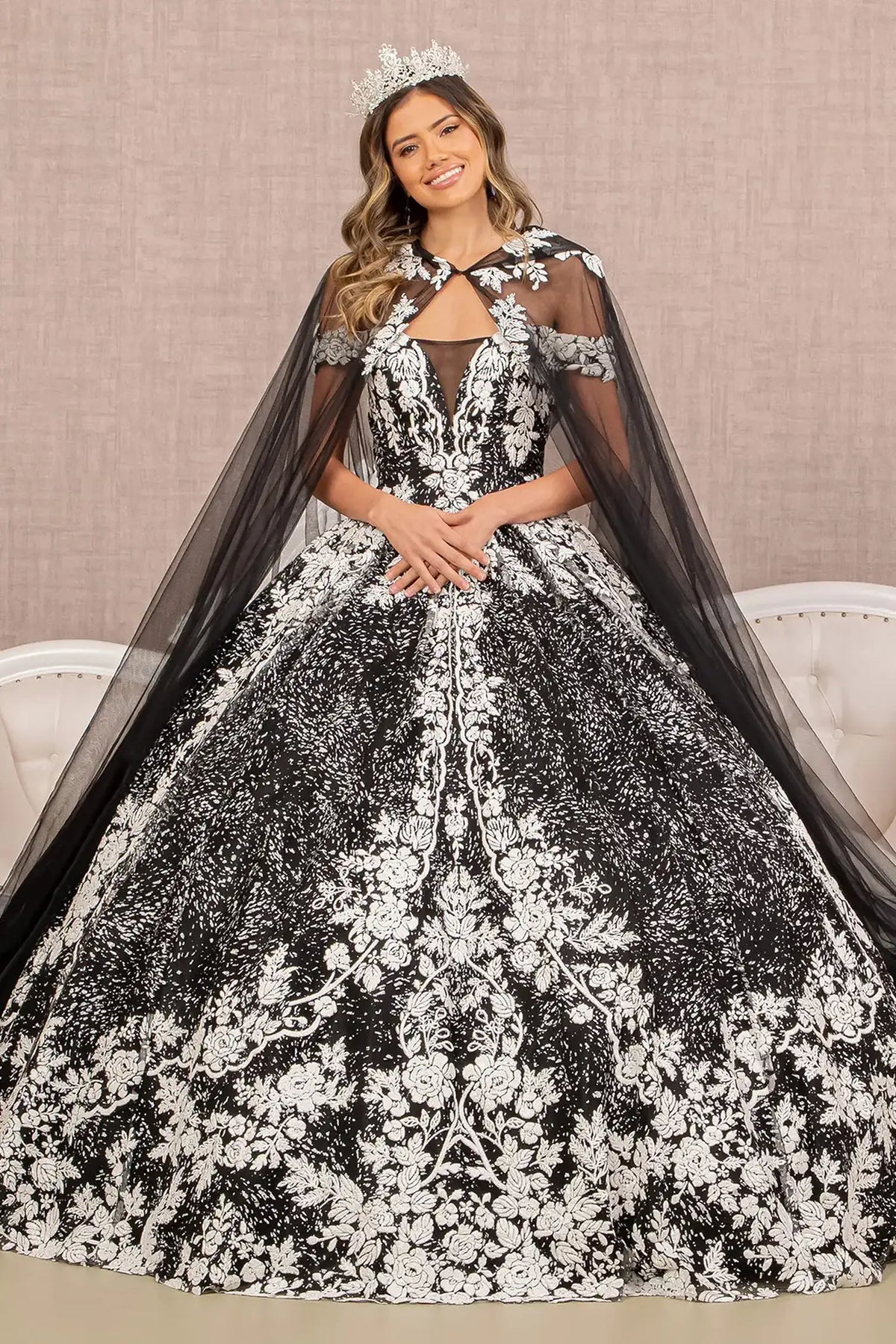 Lace-up back reveals the Black/White quinceañera ball gown with lace-up back and floral glitter pattern.